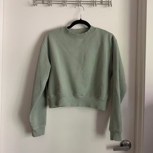 Cropped Aritizia TNA cozy fleece sweater